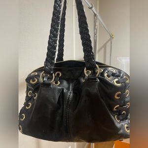 Michael Kors black leather bag with gold accent.Gently used, Great condition.